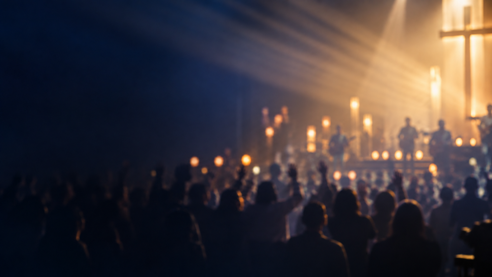 A congregation worshiping in a light-filled sanctuary beneath a cross